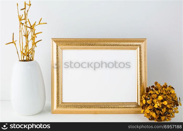 Landscape gold frame mockup with golden decor. Gold frame mockup with golden decor. Landscape white frame mockup. Empty white frame mockup for presentation artwork.