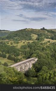Landscape image of Headstone Viaduct and Monsal Head in Peak District in Summer