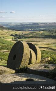 Landscape image of millstones on top of Stanage Edge in Peak District