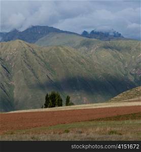 Landscape in front of a mountain range, Sacred Valley, Cusco Region, Peru
