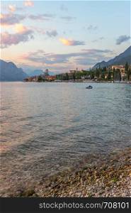 Landscape in Italy: Sunset at lago di garda, Malcesine: Lake, Clouds and village