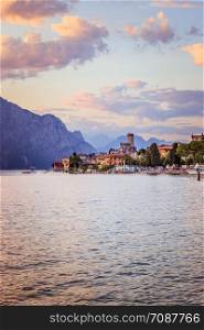 Landscape in Italy: Sunset at lago di garda, Malcesine: Lake, Clouds and village