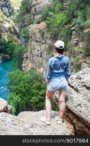 landscape in Manavgat Turkey. happy girl on the steep slope. valley and cliff. Koprulu national Park.. landscape in Manavgat Turkey. happy girl on the steep slope. valley and cliff. Koprulu national Park