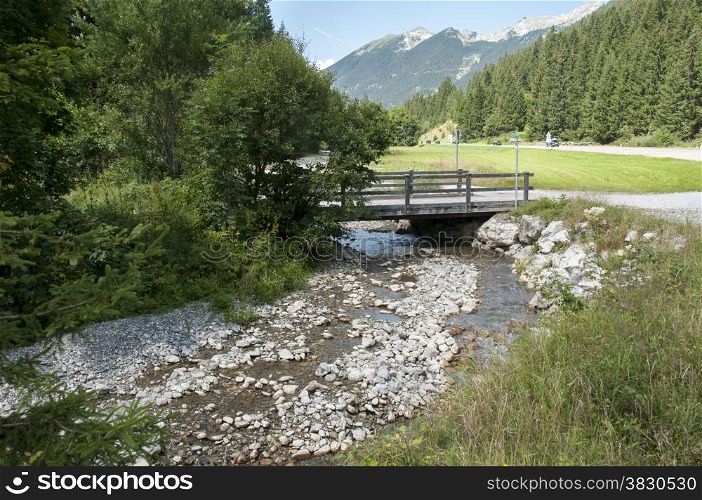 landscape italy trentino area with water rocks and bridge