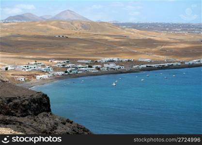 Landscape Lanzarote, small fishing village Playa Quemada, Canary Islands, Spain