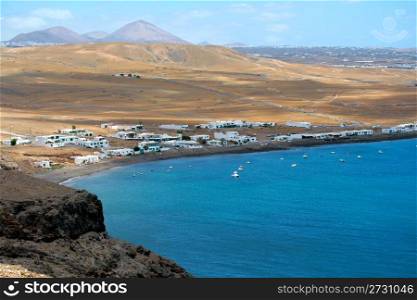 Landscape Lanzarote, small fishing village Playa Quemada, Canary Islands, Spain
