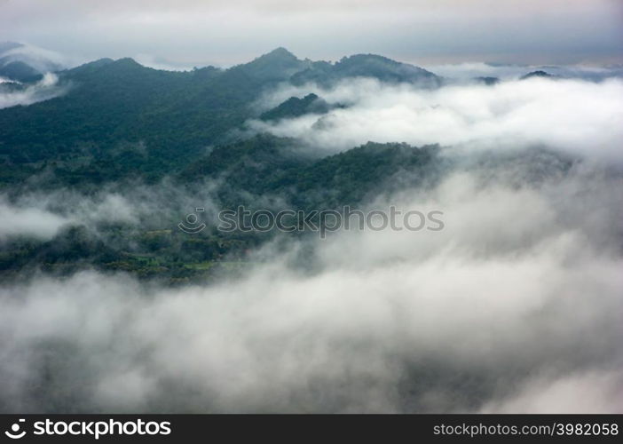 Landscape morning fog over on the mountain of Mae Moh Lampang, The most amazing Mist.. Mountain landscape with fog.