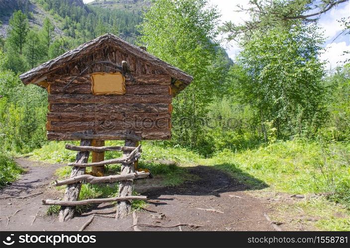 Landscape of Altai Mountains and holiday home in Russia with forest and plants