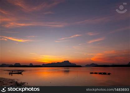 Landscape of beautiful and colorful sunrises and the limestone mountains in thailand