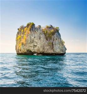 Landscape of beautiful rocky tropical island in blue sea