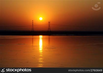 Landscape of golden sunset at the riverside