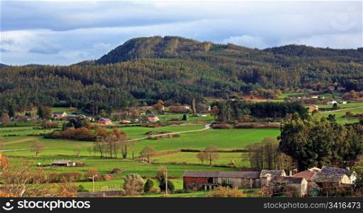 landscape of green hills in galicia, spain
