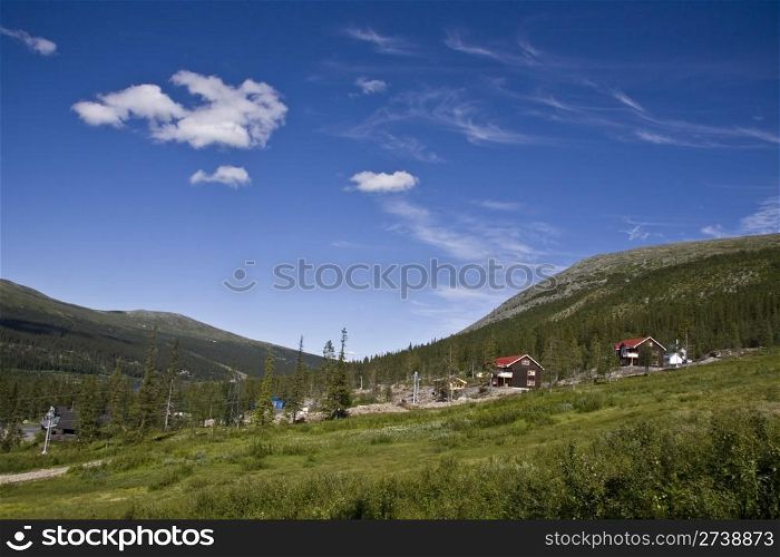 Landscape of green mountain and blue sky