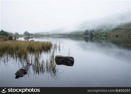 Landscape of Llyn Crafnant during foggy morning in Snowdonia National Park