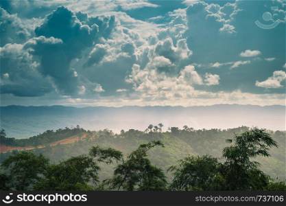 Landscape of mountain green forest and clouds sky