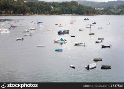 Landscape of northern Spain with small fishing boats
