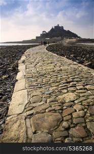 Landscape of Path revealed at low tide to St Michael&rsquo;s Mount from Marazion Cornwall England