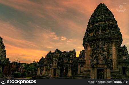 Landscape of Phimai Historical Park with sunset sky. Landmark of Nakhon Ratchasima, Thailand. Travel destinations. Historic site is ancient. Ancient building. Khmer temple classical architecture.