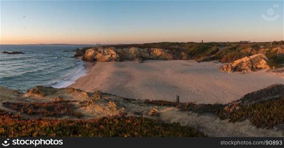 Landscape of Porto Covo beach, Portugal at sunset.