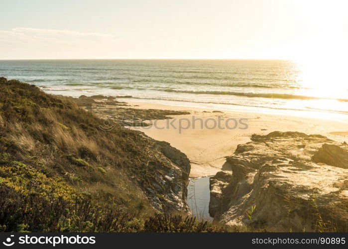 Landscape of Porto Covo beach, Portugal at sunset.