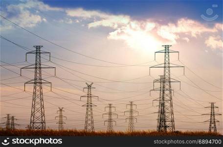 Landscape of Power Line of the Electric Wires at the Sunset Sky