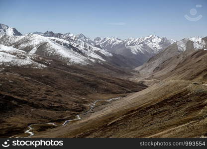 Landscape of snow capped mountain range. A view from Babusar Pass. Khyber Pakhtunkhwa, Gilgit Baltistan, Pakistan