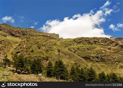 Landscape of summer mountains with blue sky and white clouds. Landscape of summer mountains with blue sky