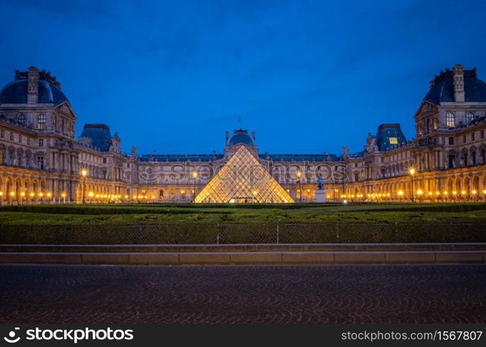 Landscape of the Louvre museum at night, Paris, France