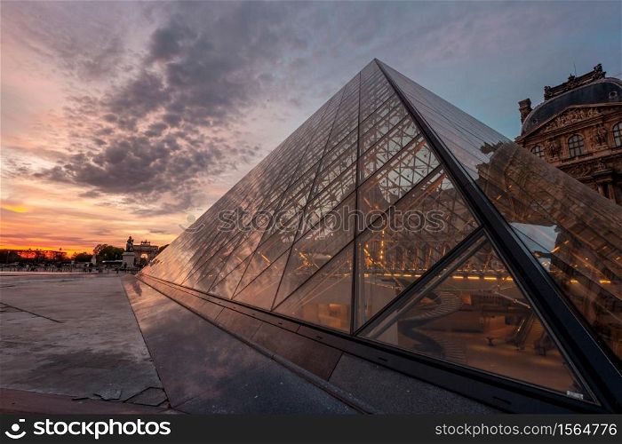 Landscape of the Louvre museum at the sunset, Paris, France