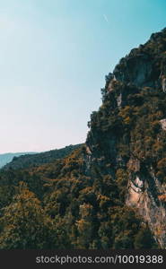 Landscape of the Prades mountains, in Tarragona, Spain. A sunny summer day with green trees