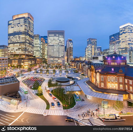 Landscape of Tokyo Station at dusk with building skyline