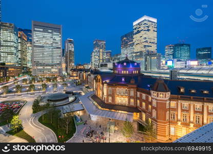 Landscape of Tokyo Station at dusk with building skyline