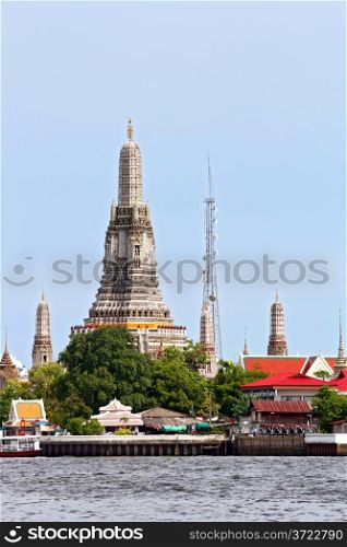 landscape of Wat Arun or Temple of dawn located at Chaophraya river in Bangkok Thailand, vertical