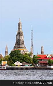 landscape of Wat Arun or Temple of dawn located at Chaophraya river in Bangkok Thailand, vertical
