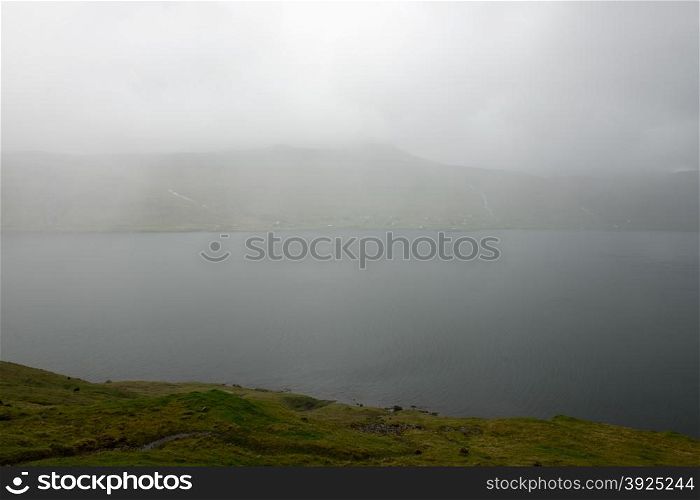 Landscape on the Faroe Islands. Landscape on the Faroe Islands on a foggy and rainy day
