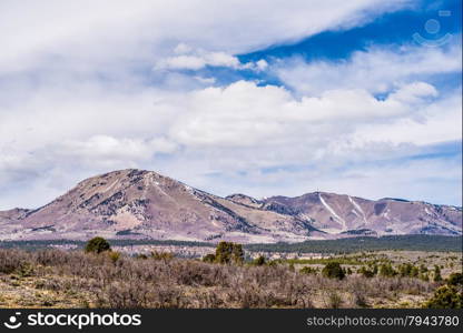 landscape overlooking south peak and abajo peak mountains. landscape overlooking south peak and abajo peak mountains in utah