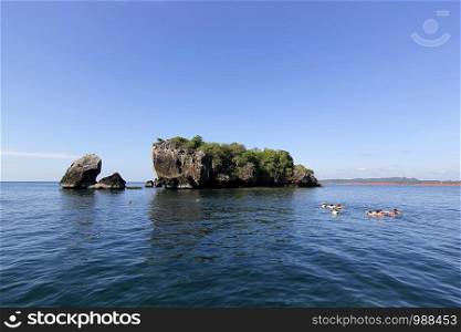 landscape photo, group of snorkeler in tropical sea of Thailand