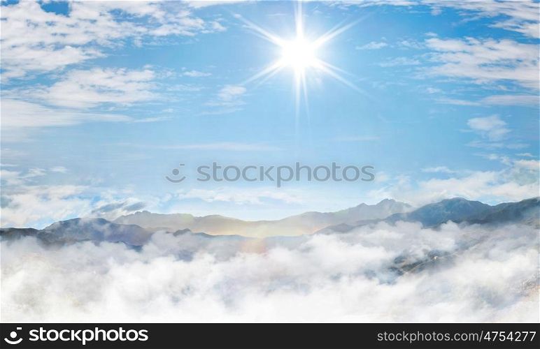 Landscape presenting high mountains and cloudy sky