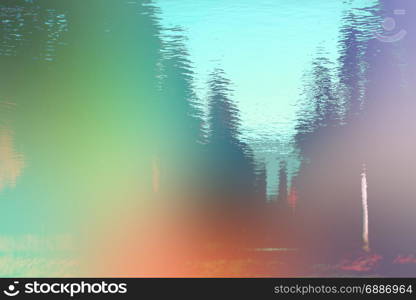 Landscape reflected in water. Nature background.