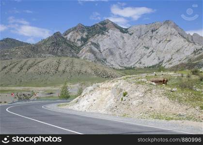 Landscape road among the high mountains of Altai in Russia