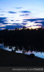 landscape sunset over the tropical lake in Thailand