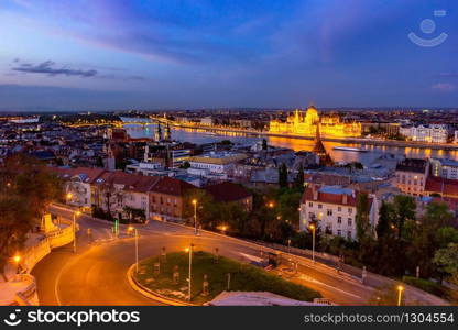 Landscape view of Budapest city in the evening, the Hungarian parliament building and otherr buildings along Danube river, Hungary.