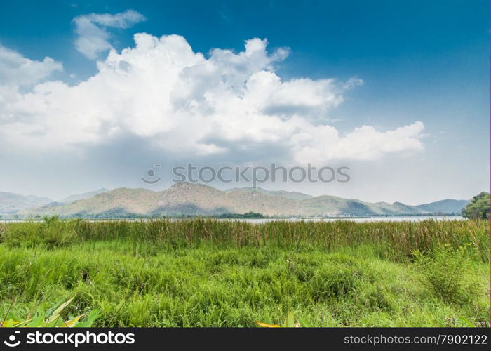 Landscape view of mountain and sky near reservoir at Karnchanaburi, Thailand