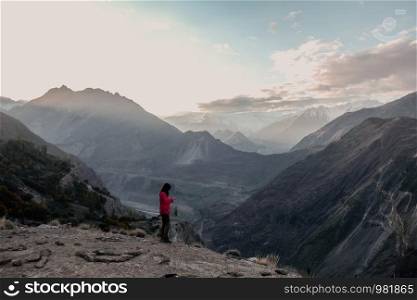 Landscape view of sunrise over Karakoram mountain range in Hunza Nagar valley. Eagle's nest viewpoint. Gilgit Baltistan, Pakistan.