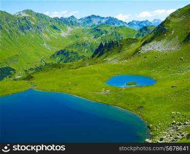 Landscape with a large lake in the Caucasus Mountains