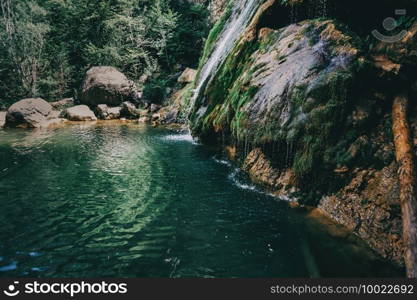 landscape with a pool with waterfall in a place of catalonia, spain