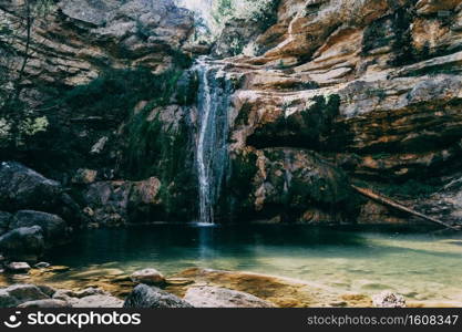 landscape with a pool with waterfall in a place of catalonia, spain