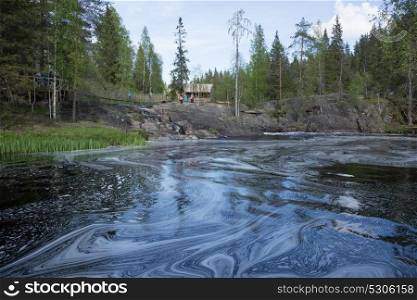 Landscape with a river in the forest. SORTAVALA, RUSSIA - JUNE 10, 2017: Landscape with a river in the forest of Karelia