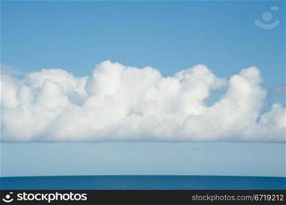 Landscape with beautiful cloudy sky and calm sea