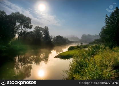 Landscape with moon light at night over river. Fog above water and trees